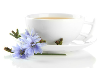 Cup of tea with chicory, isolated on white