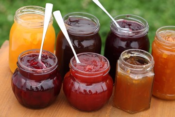 Glass with jam and spoons