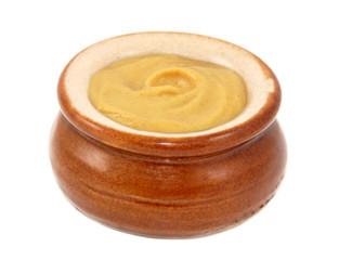 Dijon mustard served in a small ceramic pot