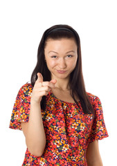 Close-up of young woman pointing at camera