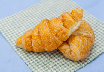 Breakfast with fresh baked croissants and coffee.