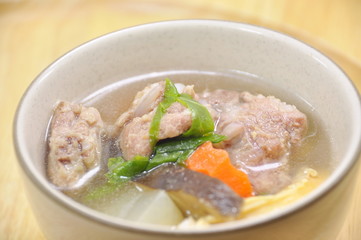 Pork ribs and vegetable soup in a  bowl