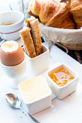 Breakfast with coffee and croissants