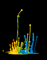 Colored splashes isolated on black background