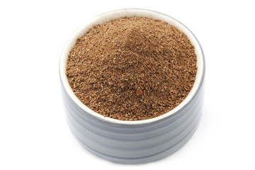 Cinnamon Powder in ceramic Bowl