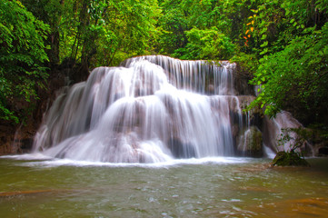Fototapeta na wymiar Waterfall in deep rain forest jungle (Huay Mae Kamin Waterfall i