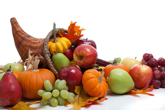 An Overflowing Cornucopia On A White Background