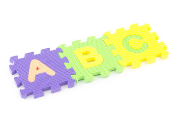 ABC letters puzzle pieces