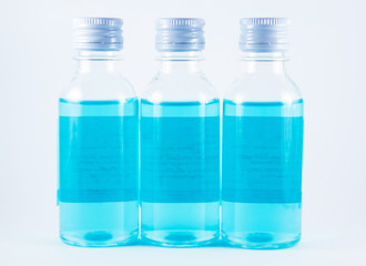 Blue liquid in plastic bottle