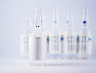 Transparent ampule and white label