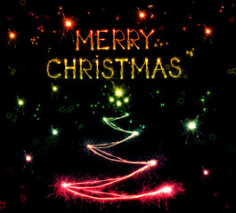 Sparkling Christmas tree on black background