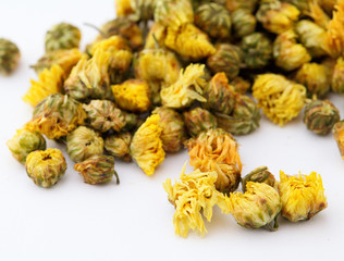 Dried chamomile tea isolated on white background