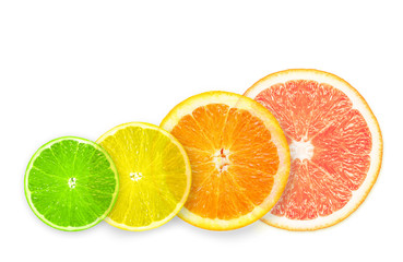 Stack of citrus fruit slices isolated on white background.