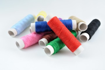Many spools of thread