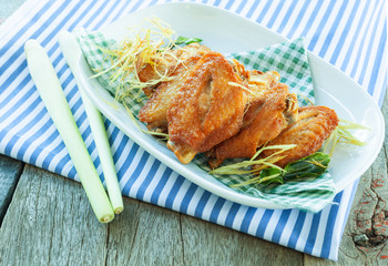 Chicken wings deep fried with herb.