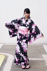Pretty young woman wearing Japanese kimono