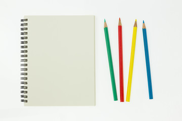 Open Blank Page Notebook With Pastel On White Background
