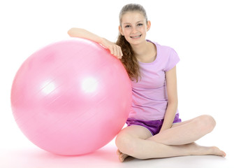 Sportliche Jugendliche mit Gymnastikball