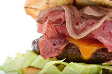 Bacon cheeseburger close-up with space for your text
