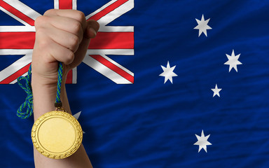 Gold medal for sport and  national flag of australia