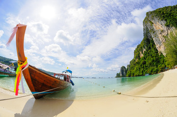 Fototapeta na wymiar Tropical beach, traditional long tail boat, Poda Bay, Thailand