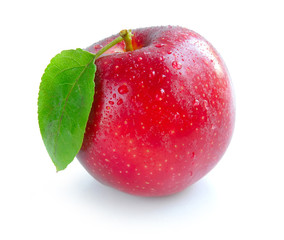 Ripe red apple with a leaf on a white background