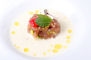 Fresh Tuna tartare served in coconut sauce