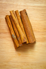Hill vanilla beans on wooden background