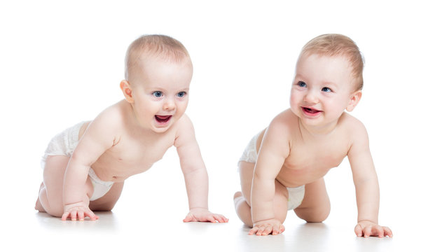 Smiling Babies Girl And Boy Crawling On Floor