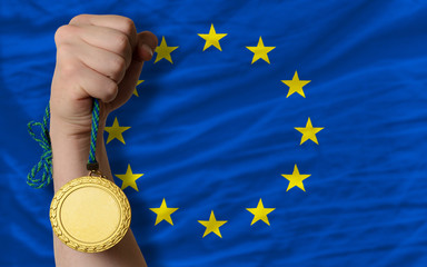 Gold medal for sport and  national flag of europe
