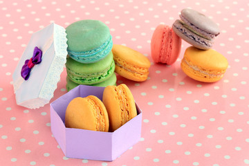 Gentle macaroons on pink background