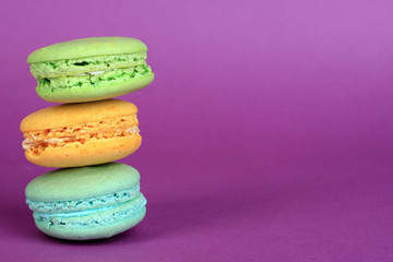 Macaroons on purple background