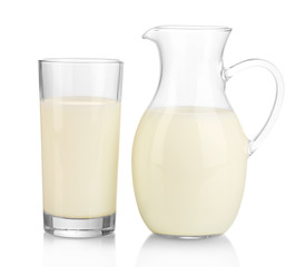 Milk in jug and glass isolated on white