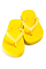yellow summer flip flop shoes over white