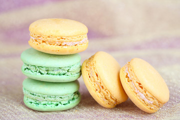 Macaroons on fabric background