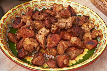 Preparation fried chicken fillets with vegetables