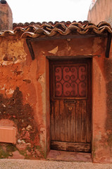 an old door in a little house