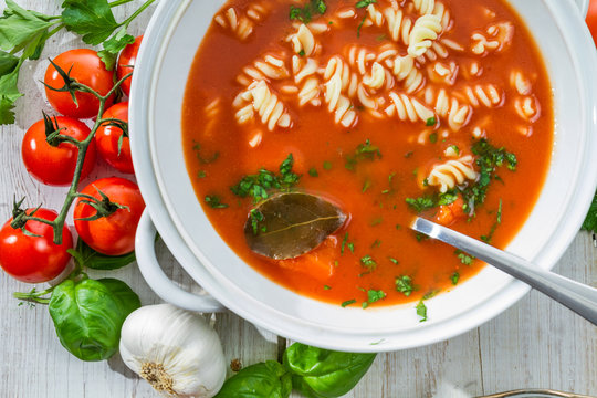 Freshly sliced ​​tomatoes and tomato soup
