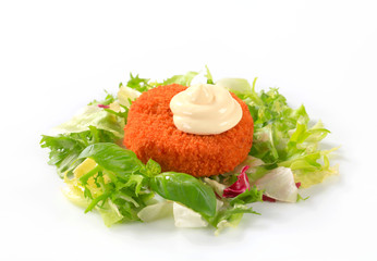 Fried cheese or fish with green salad