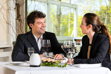 Businesspeople having lunch in restaurant