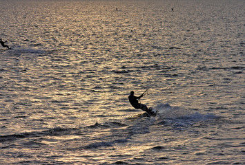 kitesurfer at sunset