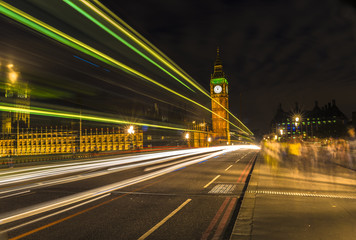 Fototapeta na wymiar The Big Ben at night and light trails, London