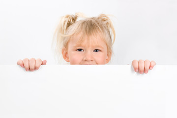 Little girl holding blank sign