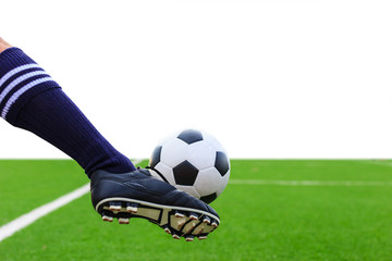 foot kicking soccer ball isolated with clipping path