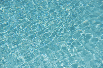 Obraz premium Teal Blue Water in a Swimming Pool