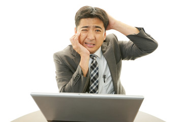苦悩するビジネスマン