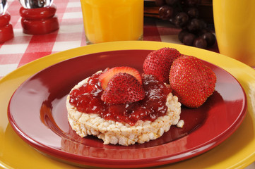 Strawberry jam on a rice cake