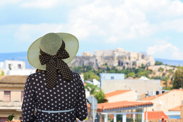Fototapeta premium young woman looking at Acropolis