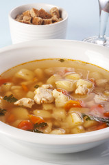 chicken soup with vegetables close up
