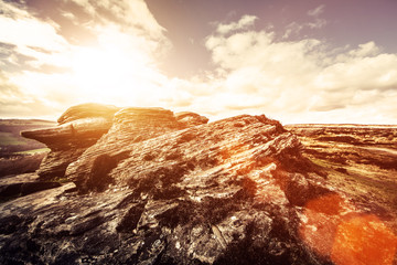 rock formation sun flare